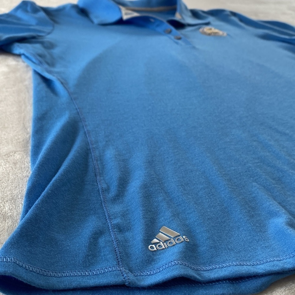 Adidas PGA Women's Blue Golf Polo Shirt. PGA Crest on chest and logo on sleeve. - Picture 4 of 13